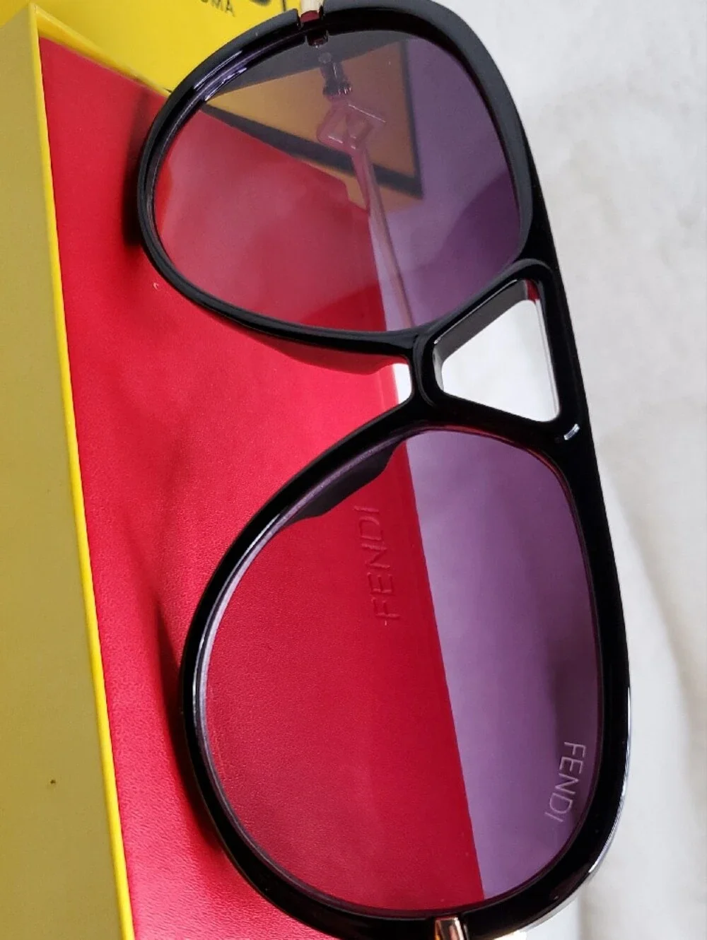 F Black and Gold Rimless Sunglasses